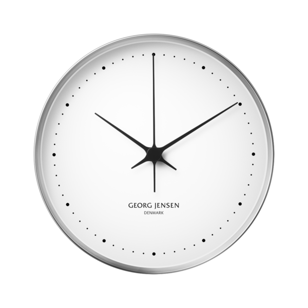 Technoliving - A modernista KOPPEL falióra, Henning Koppel által még 1960-ban tervezett legelső óra stílusbeli finomítása. A mutatói túlnyúlnak a középponton, ahol az órákat és perceket jelző körök váltják fel a hagyományosabb római számokat. .